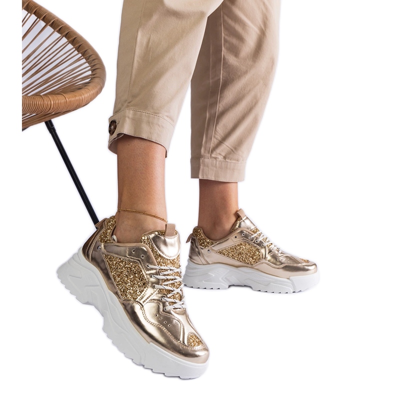 Gold women's sneakers with glitter inserts golden