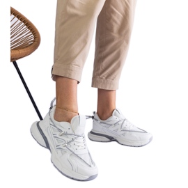 White women's sneakers with a massive sole White women's sneakers with a massive sole