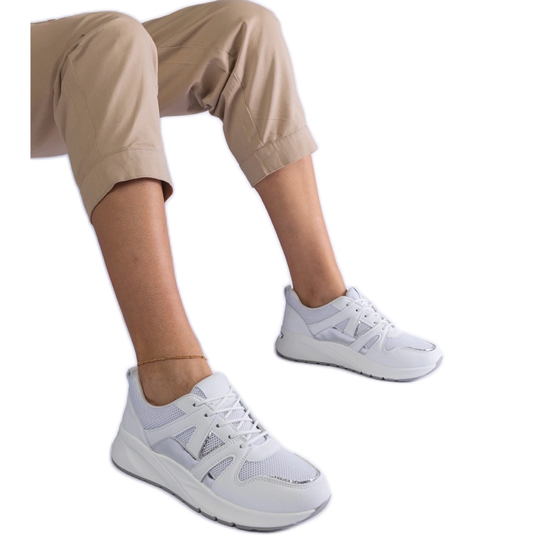 White sneakers with a thick sole White sneakers with a thick sole