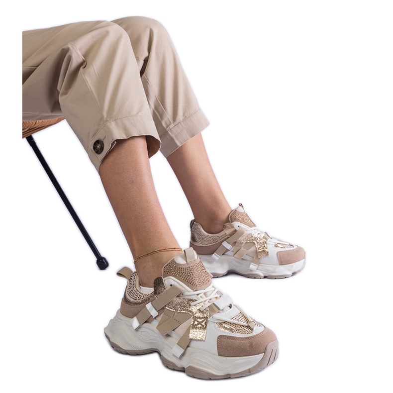 Beige sneakers with gold inserts Beige sneakers with gold inserts