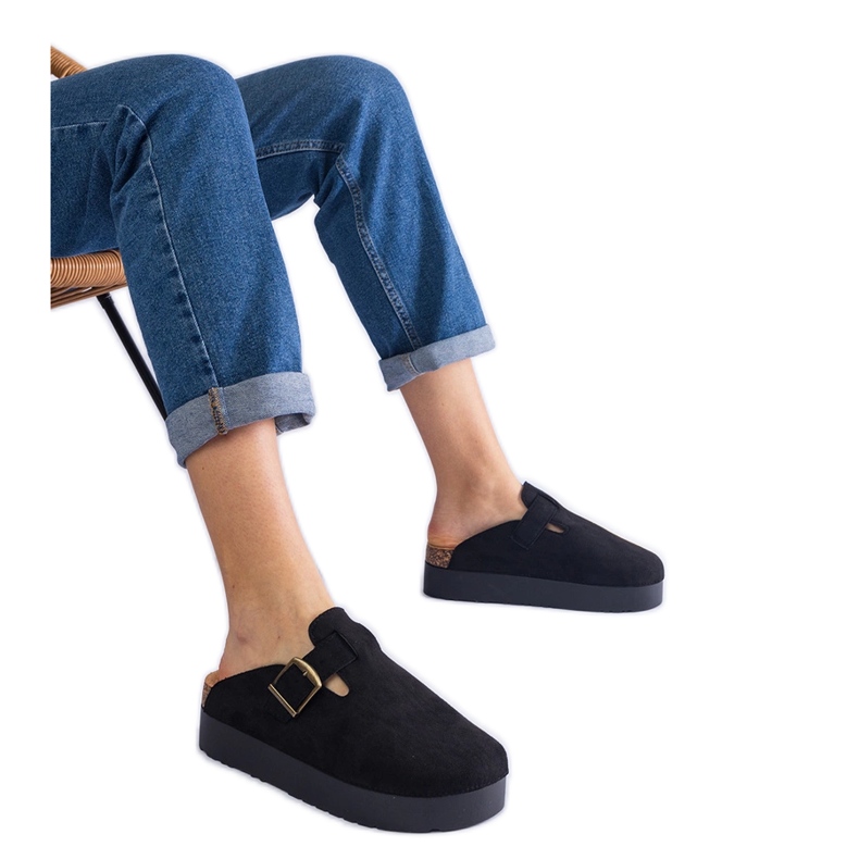 Black women's slippers on the platform with a buckle Black women's slippers on the platform with a buckle