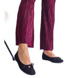Black ballerinas with a decorative bow