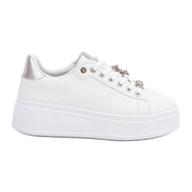 Eco leather sneakers with white and silver pins Eco leather sneakers with white and silver pins