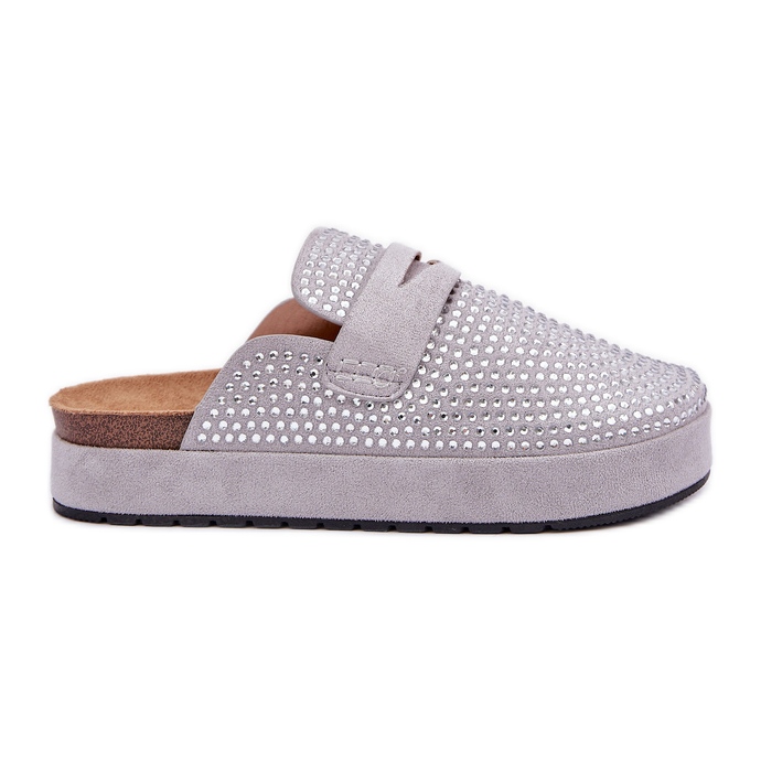 Women's flip flops decorated with zircons on the gray platform grey