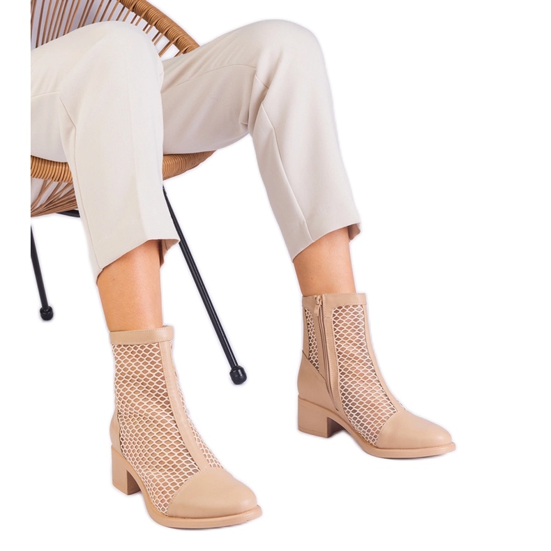Beige mesh boots on the post