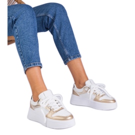 White and gold platform sneakers golden