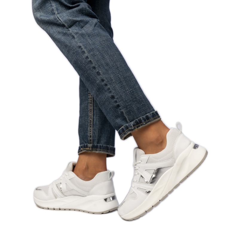 Women's white sports sneakers