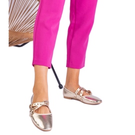 Golden ballerinas made of eco -leather decorated with buckles