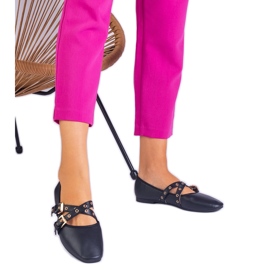 Black ballerinas made of eco -leather decorated with buckles