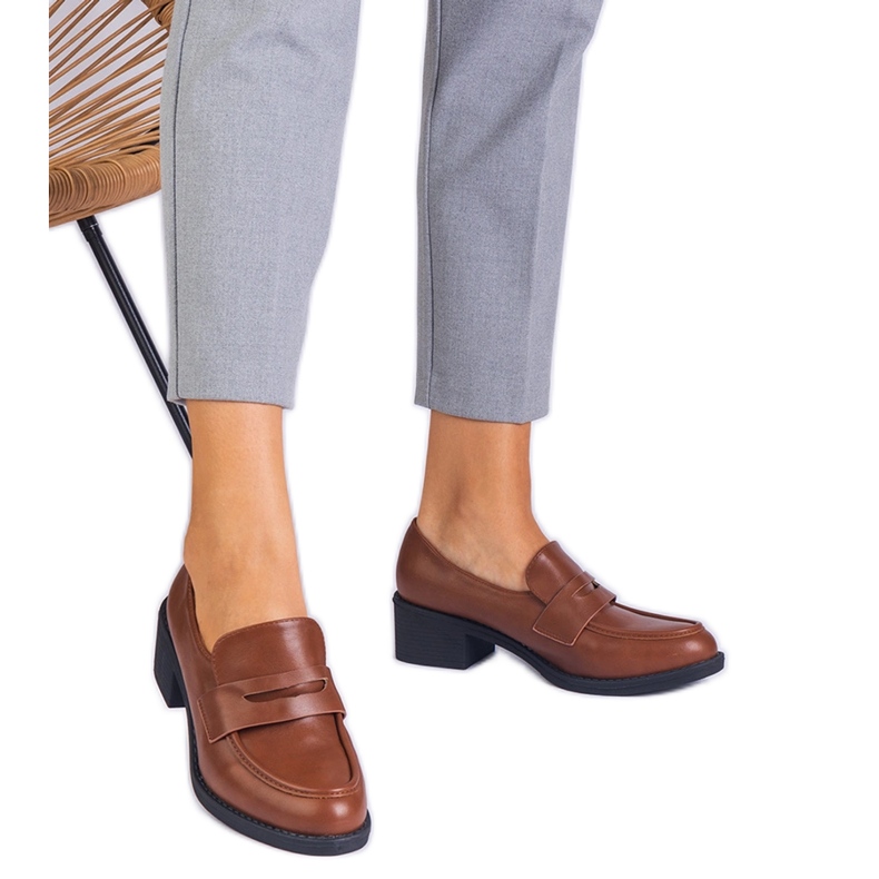 Brown eco -leather pumps on a low post