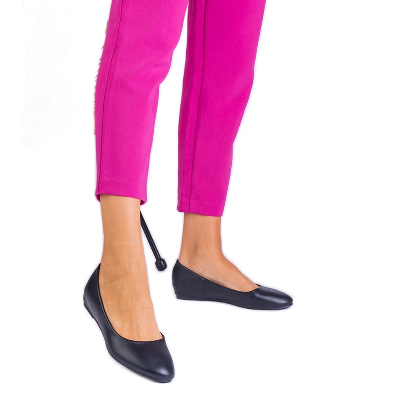 Black ballerinas on a hidden wedge of eco -leather