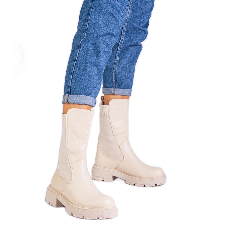 Beige boots with a material insert
