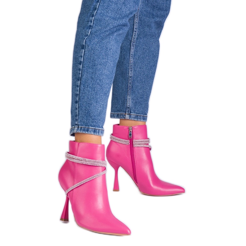 Pink boots on a high heel decorated with zircons