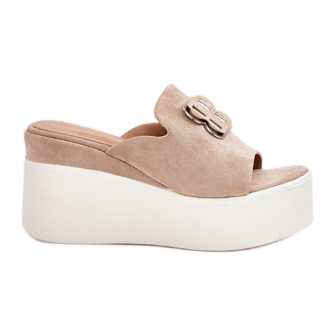 Slippers on the platform and wedges with beige ornament