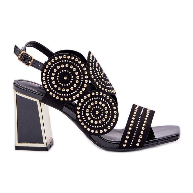 Decorated sandals on the black post