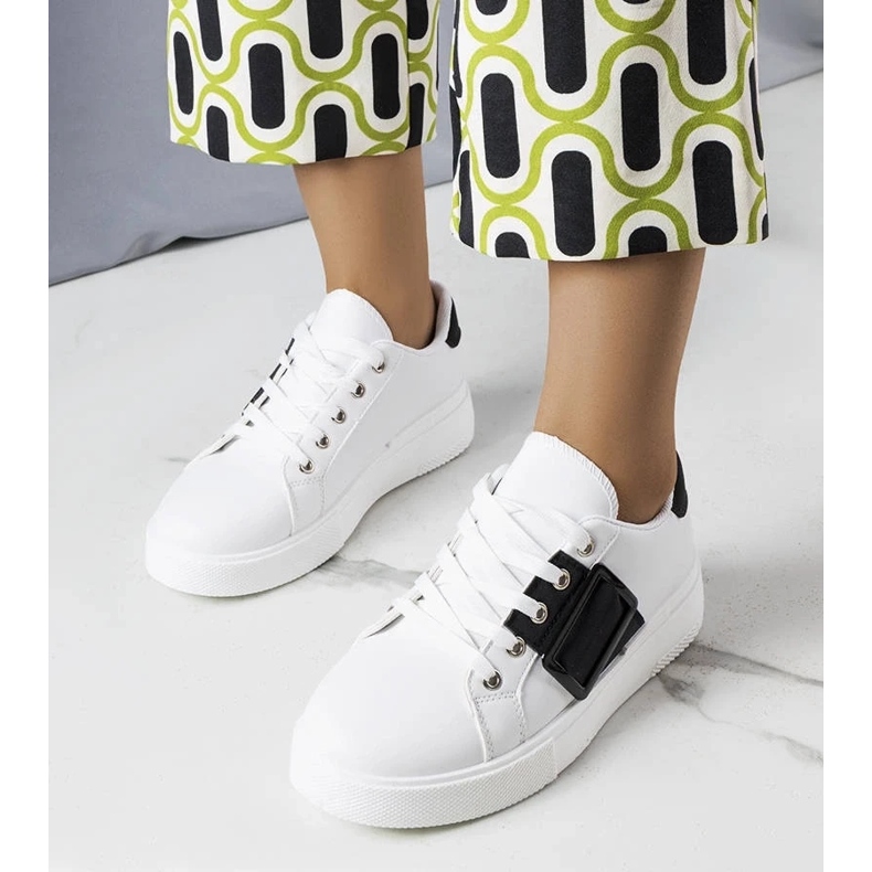 D/GMR White sneakers decorated with a black Erin buckle