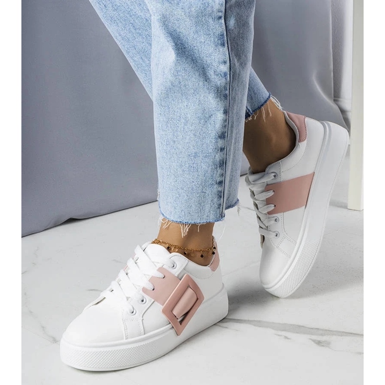 D/GMR White sneakers decorated with a pink Toni buckle