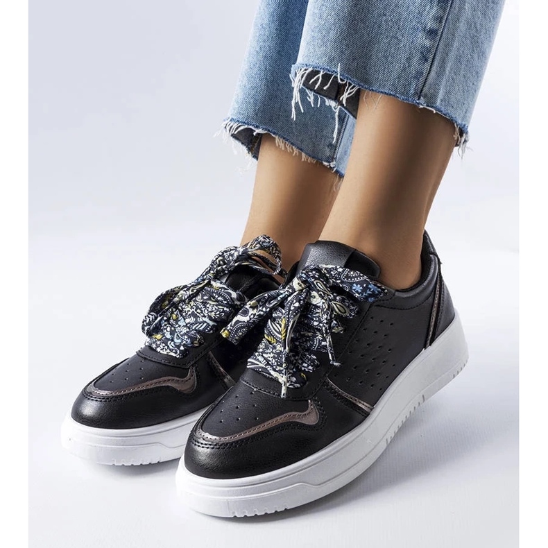 D/GMR Black sneakers tied with a pryor ribbon