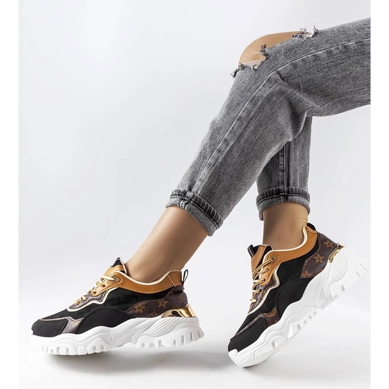 D/GMR Black sneakers on an irregular sole from Alta