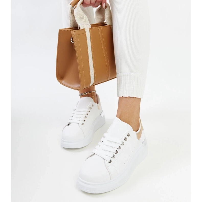 D/GMR White sports shoes with a gold Meriana insert