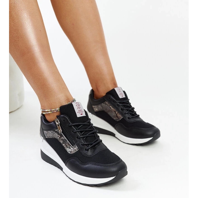 Black women's wedge sneakers by Cross Jeans