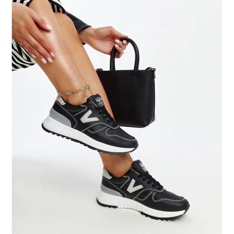 Black sneakers with a thick Cettina sole Black sneakers with a thick Cettina sole