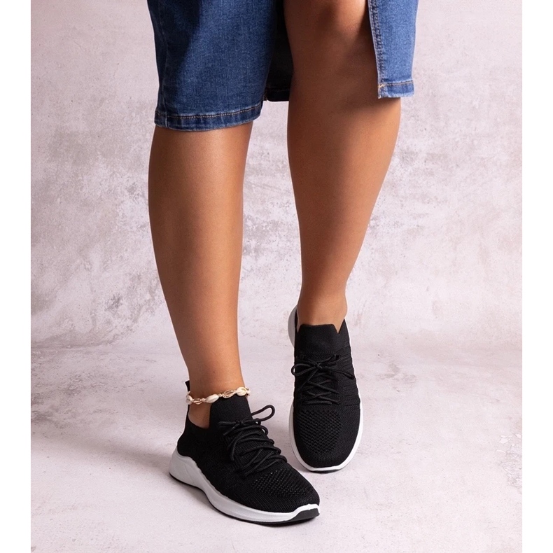 D/CEO Black Muaza sports sneakers