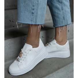 D/CEO White platform sneakers decorated with a Mavien teddy bear