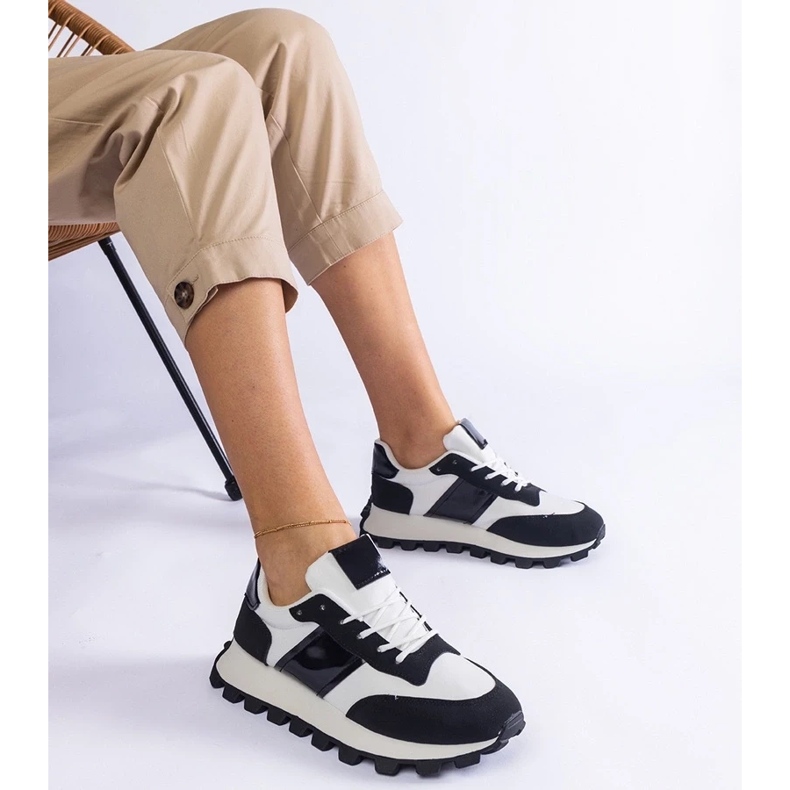 D/CEO Black sneakers with a visible Restia protector