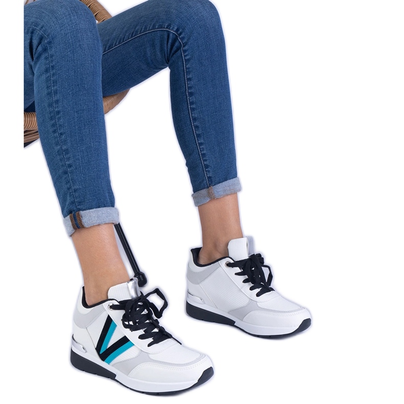 White women's sneakers on a hidden wedge White women's sneakers on a hidden wedge