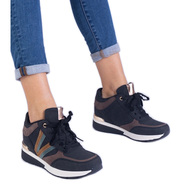 Black women's sneakers on a hidden wedge Black women's sneakers on a hidden wedge