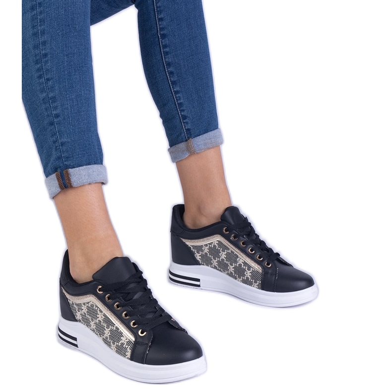 Black women's sneakers on a hidden wedge