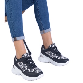 Black women's sports sneakers with a metallic insertion