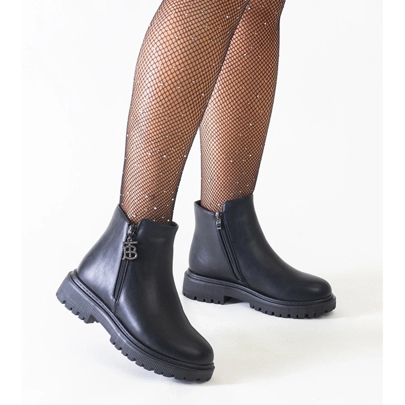 D/CEO Black ankle boots with a decorative pendant on the Melane eco-leather platform
