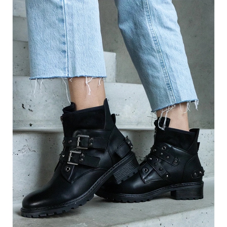 D/CEO Black ankle boots decorated with studs with a flat heel by Neffa