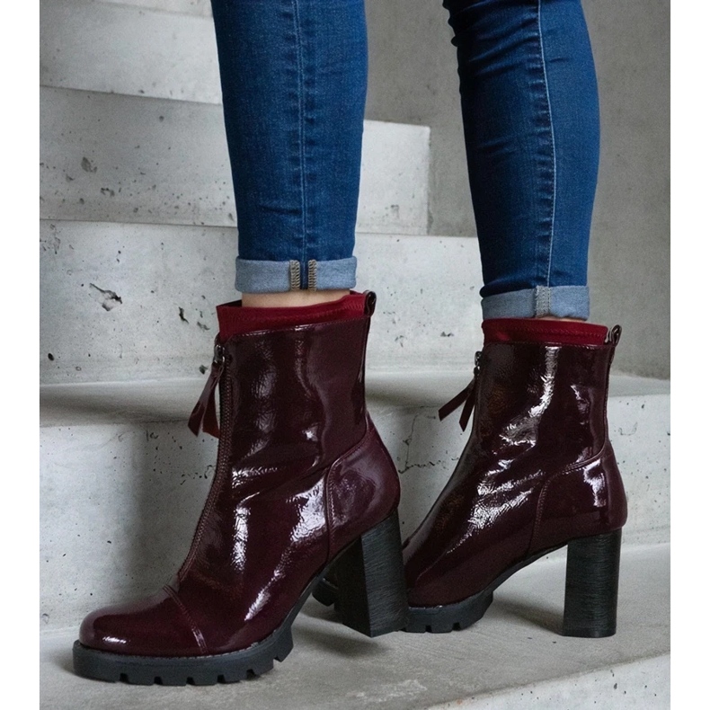 D/CEO Burgundy patent ankle boots decorated with a Tiri clasp red