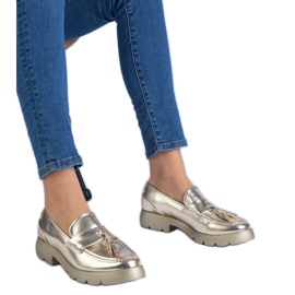 Golden metallic classic shoes with fringes Golden metallic classic shoes with fringes