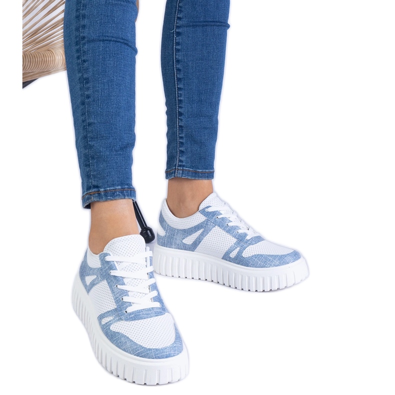 Blue openwork sneakers on a massive sole