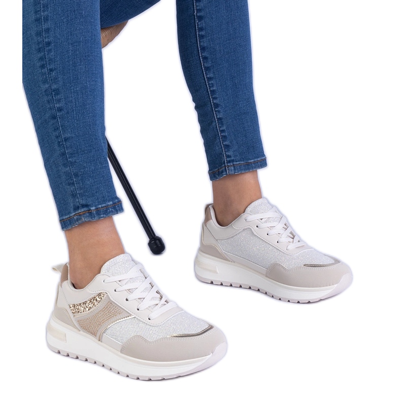 Beige sneakers decorated with glitter and zircons