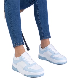 Blue sneakers on a thick sole