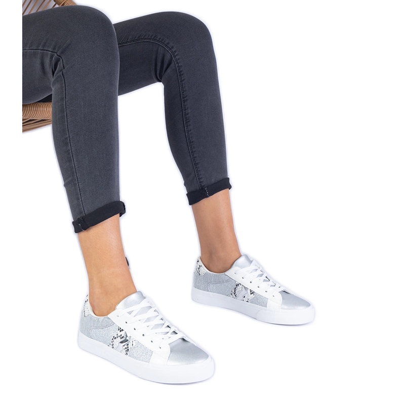 Silver sneakers with an animal motif decorated with glitter