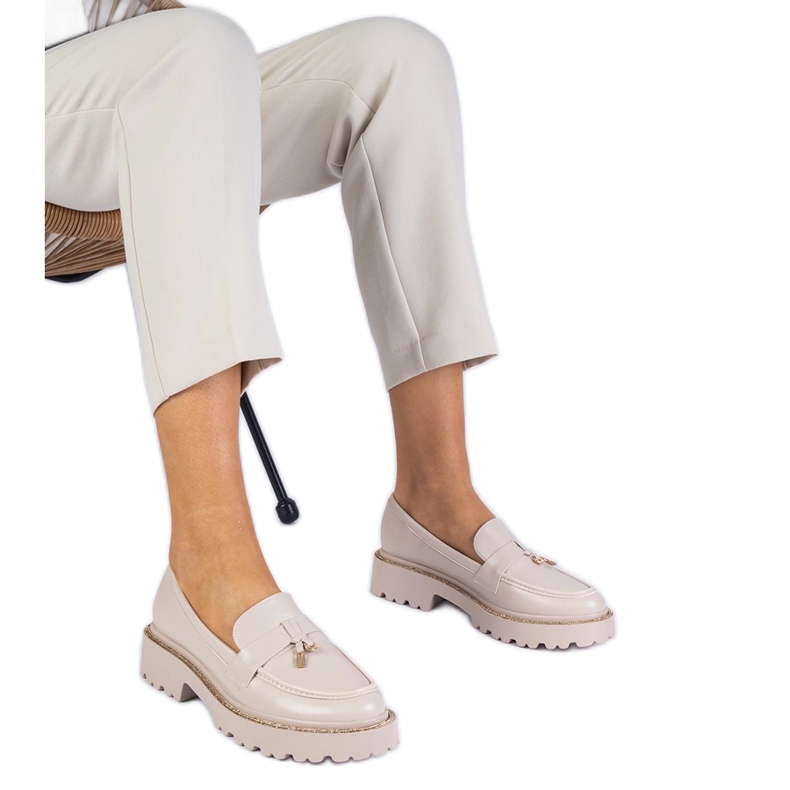 Beige moccasins decorated with rhinestones Beige moccasins decorated with rhinestones