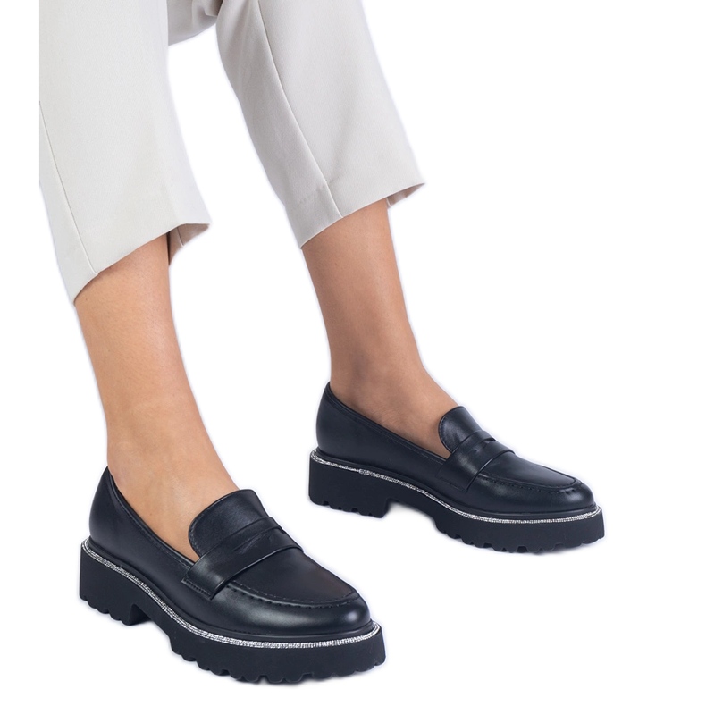 Black women's loafers on a thick sole
