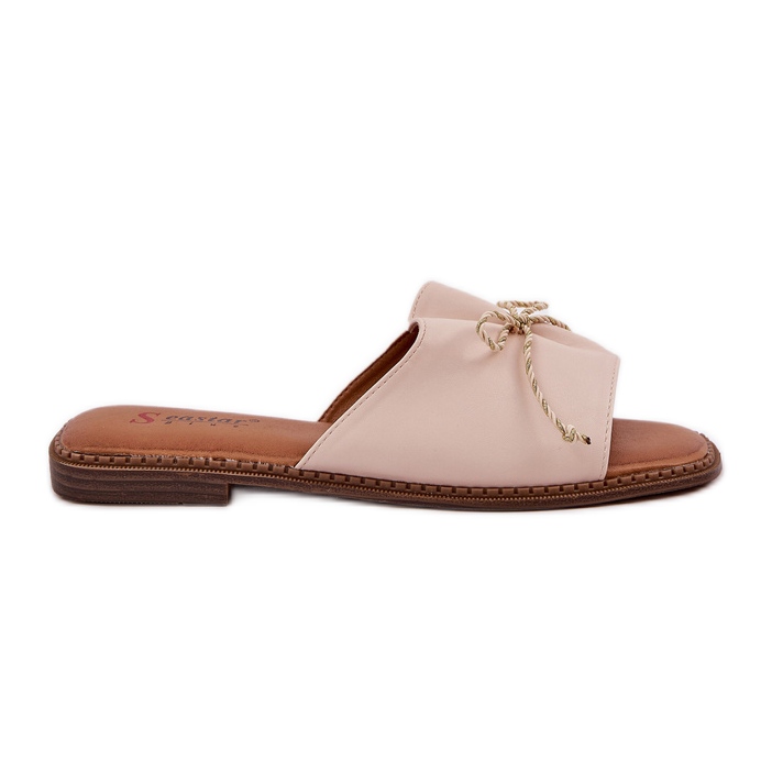 Flat soles with a decorative beige bow Flat soles with a decorative beige bow