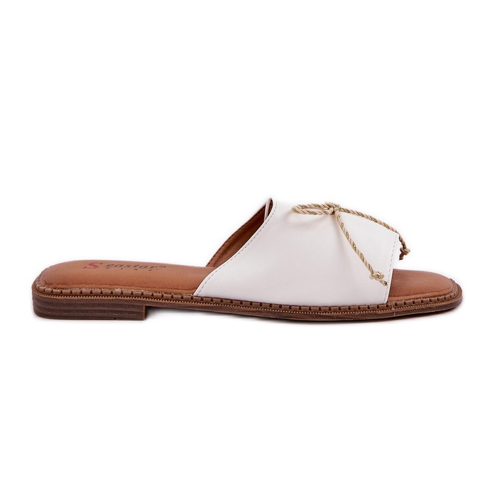 Flat sole flip flops with a decorative bow white