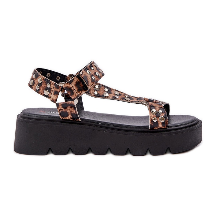 Decorated sandals on the brown leopard print platform