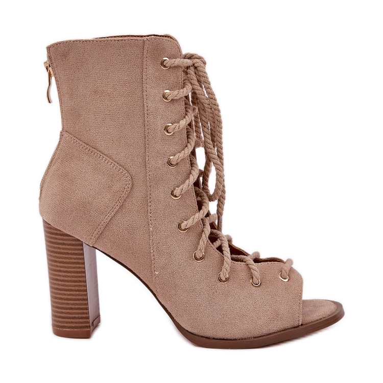Sandals on the post with the upper and beige lacing