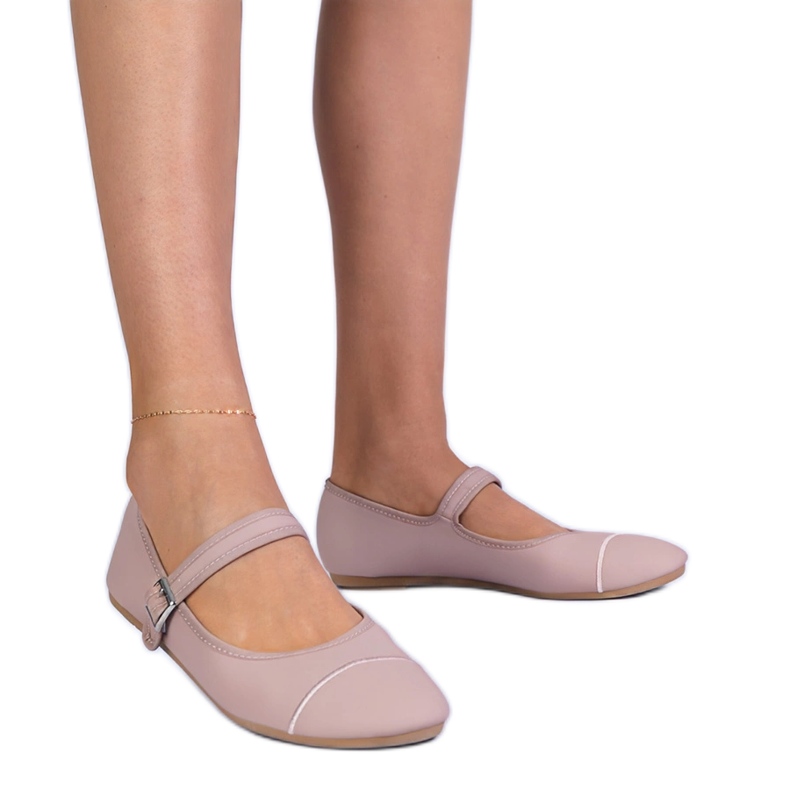 Pink ballerinas with a matte finish fastened with a buckle