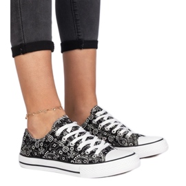 Black women's material sneakers in Aztec style