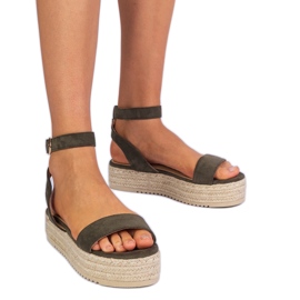 Green Espadrile sandals on the platform